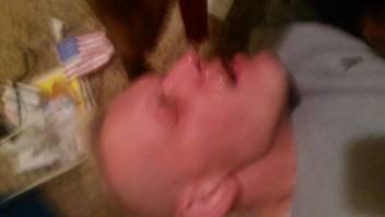 Cheerful gay man eagerly fellating a canine's penis in high definition