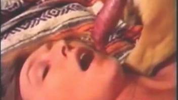 Naked lady chokes on canine cock during homemade blowjob porn