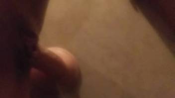 Naked self-pleasure session with dog tonguing her clitoris
