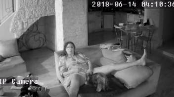 Black and white bestiality clip featuring a lustful dark-haired mature woman