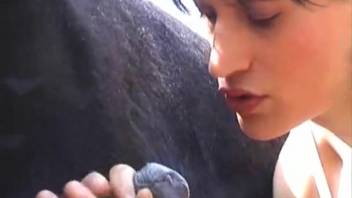 Brunette with cropped hair adores a massive stallion dick
