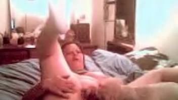 Overweight older woman having her vagina eaten out on the mattress